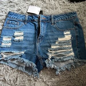 Never worn distressed shorts